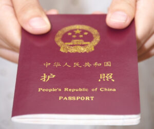 Chinese-passport-in-hand1